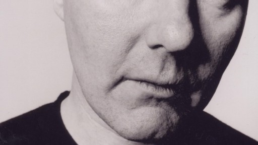 black and white close up of Irvine Welsh