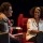 Jackie Kay and Benardine Evaristo on stage laughing at HOME theatre